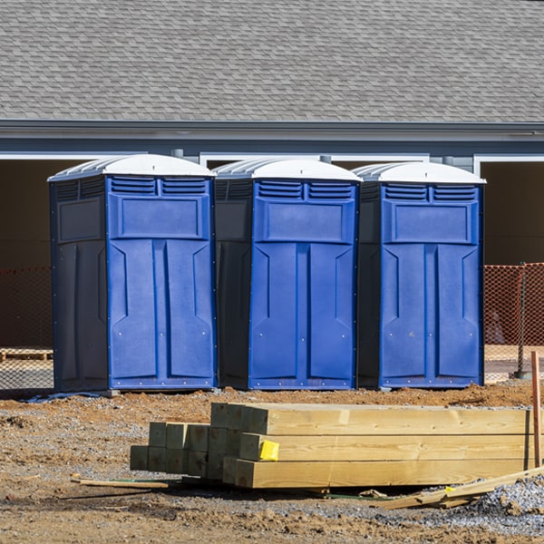 what is the cost difference between standard and deluxe portable toilet rentals in West Chazy New York